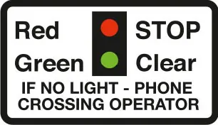 Miniature warning lights at a level crossing