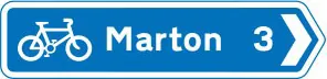 Cycle route direction sign