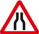 Road narrows on both sides